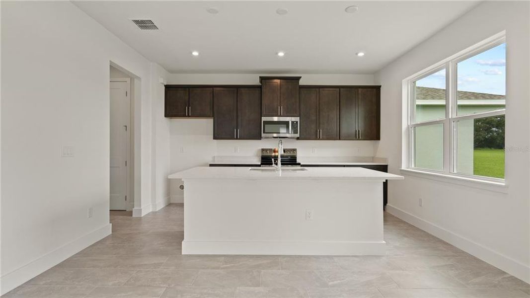 Furnished interior view inside a new home in Trailside, Mount Dora (Image 8).