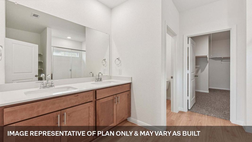 Representative furnished interior of a home built from the The Mitchell by D.R. Horton in Bar W Ranch, Leander (Image 10).