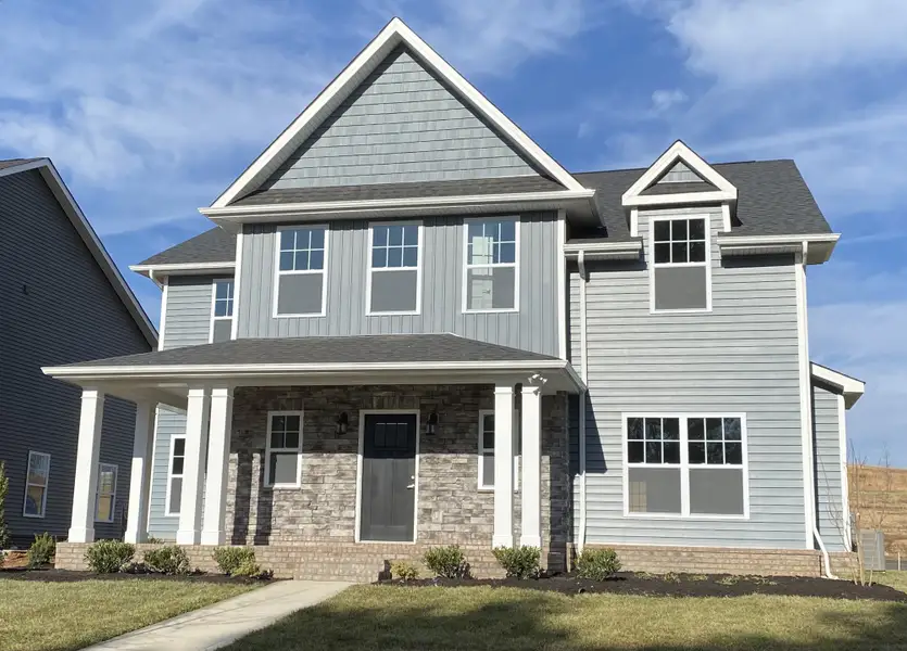 Representative exterior photo of a completed home built from the The Wyndham by Smithbilt Homes in The Preserve, Oak Ridge, TN (Image 2).