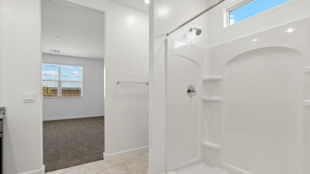 Spacious, unfurnished interior of a new home in Radiance at Superstition Vistas, Apache Junction (Image 27).