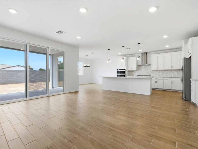 Spacious, unfurnished interior of a new home in White Tank Foothills Signature Series, Waddell (Image 9).