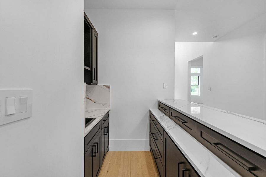 wet bar next to kitchen