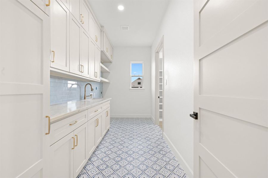 Laundry Room- Off the Primary Suite