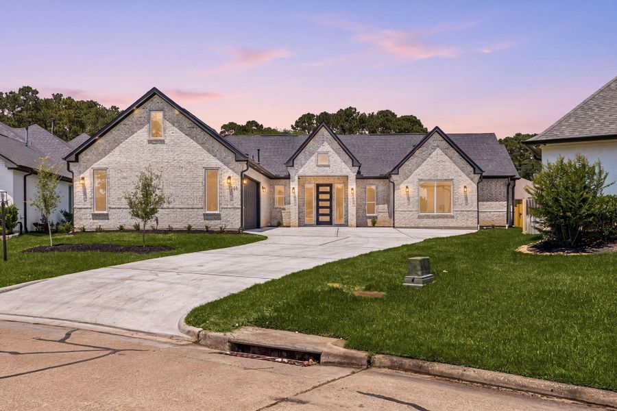 Front exterior of a new home in , Montgomery, TX, highlighting curb appeal (Image 25).