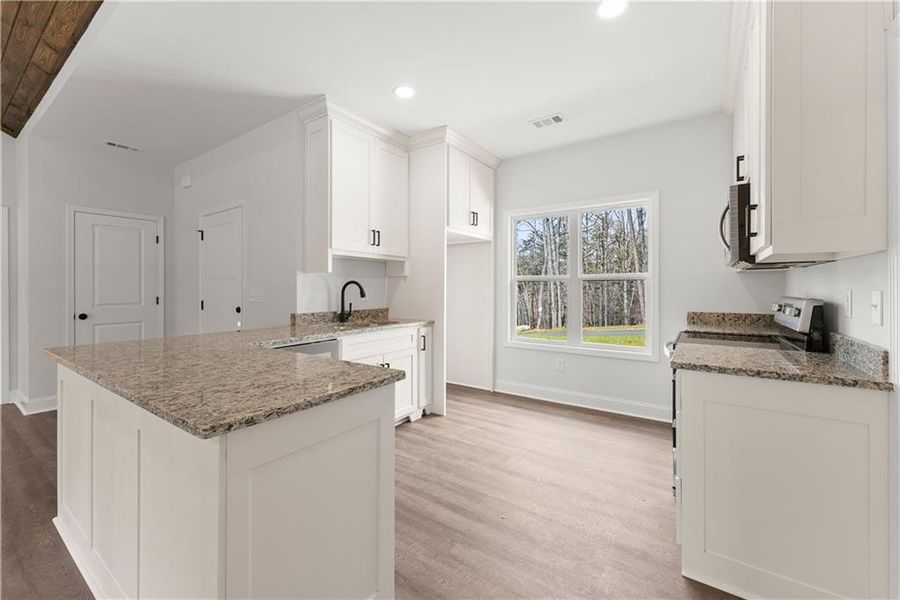 Furnished interior view inside a new home in , Cleveland (Image 11).