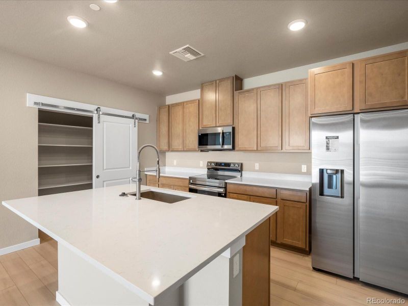 Furnished interior view inside a new home in Gateway Commons, Denver (Image 7).