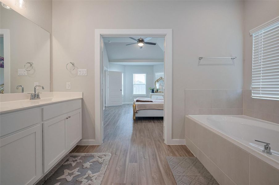 Bathroom with shower stall and vanity.