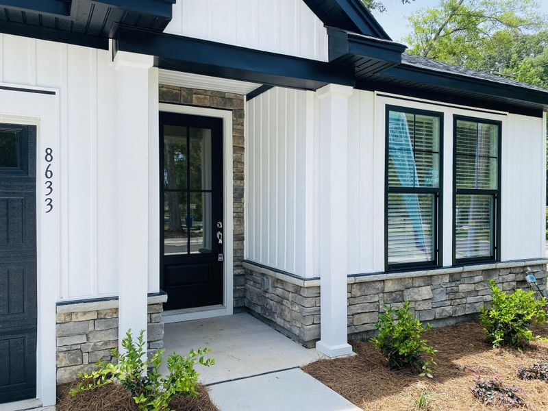 Front exterior of a new home in , North Charleston, SC, highlighting curb appeal (Image 25). Front exterior of a new home in , North Charleston, SC, highlighting curb appeal (Image 25).