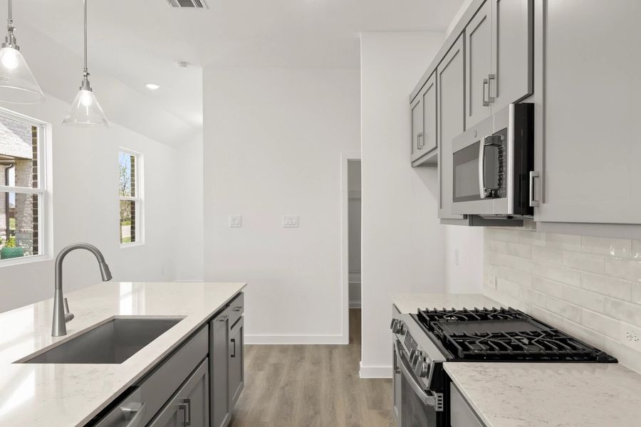 Kitchen featuring the Milan Collection Kitchen featuring the Milan Collection