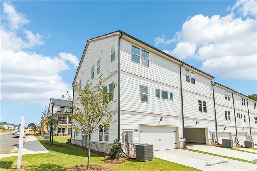 Exterior details and patio area of a home in Martin Springs - Highland Series, Lawrenceville (Image 26).