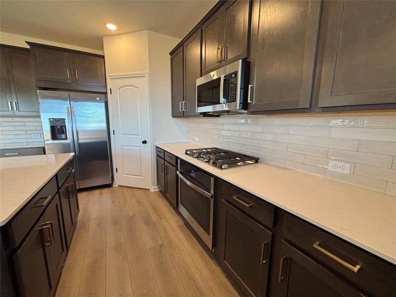 Furnished interior view inside a new home in Cannon Ranch 45s, Dripping Springs (Image 11).