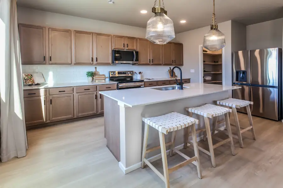 Representative furnished interior of a home built from the Clemens by Hartford Homes in Bloom, Fort Collins (Image 18).