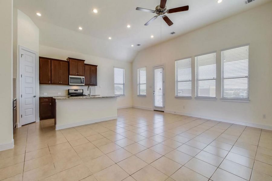 Representative unfurnished interior of a home built from the Oaks 1596 by Brohn Homes in Oaks at San Gabriel, Georgetown (Image 12).