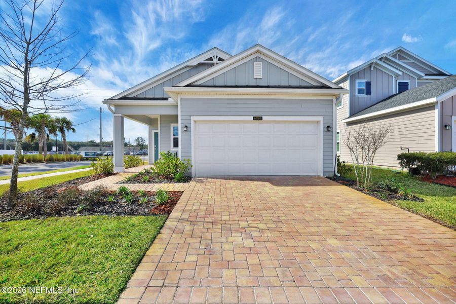 Front exterior of a new home in , Jacksonville, FL, highlighting curb appeal (Image 22).