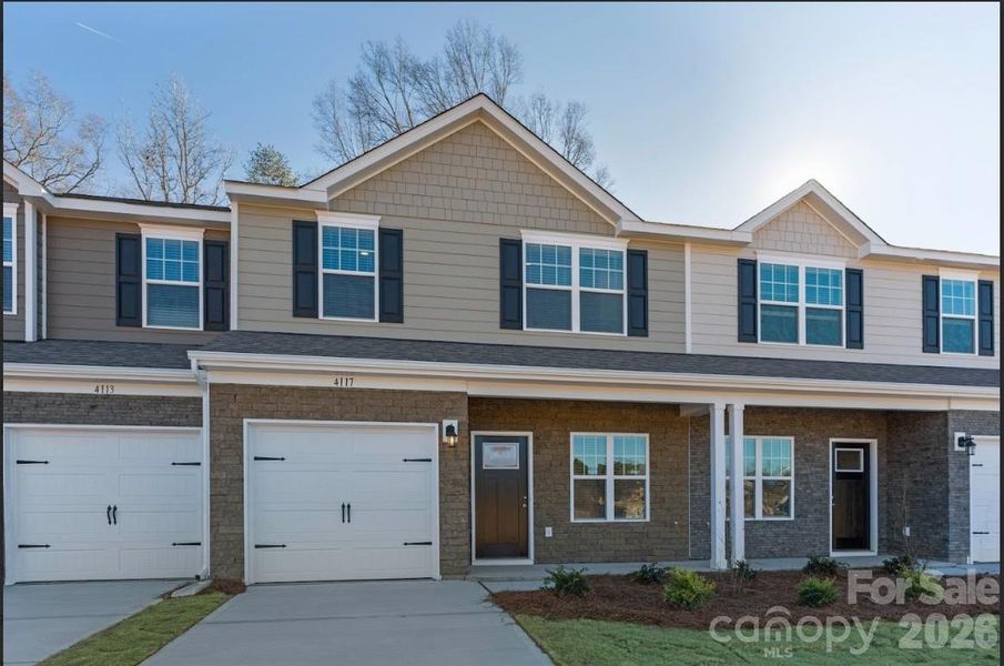 Front exterior of a new home in Sierra Ridge, Gastonia, NC, highlighting curb appeal (Image 1). Front exterior of a new home in Sierra Ridge, Gastonia, NC, highlighting curb appeal (Image 1).