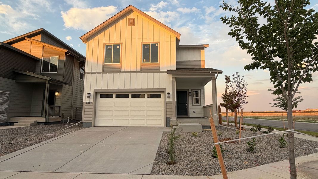 Front exterior of a new home in Legato, Commerce City, CO, highlighting curb appeal (Image 1). Front exterior of a new home in Legato, Commerce City, CO, highlighting curb appeal (Image 1).