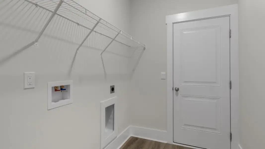 Spacious, unfurnished interior of a new home in The Retreat at Indigo Preserve Townhomes, Leland (Image 29).