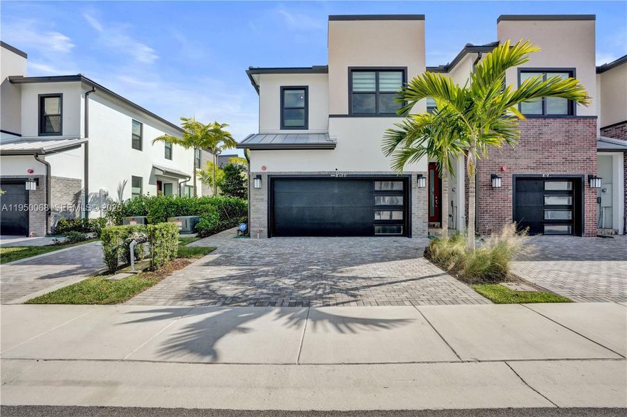 Corner unit with a 2 car garage