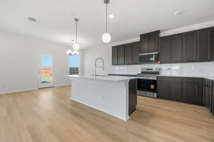 Furnished interior view inside a new home in Salerno - Heritage Collection, Round Rock (Image 11). Furnished interior view inside a new home in Salerno - Heritage Collection, Round Rock (Image 11).