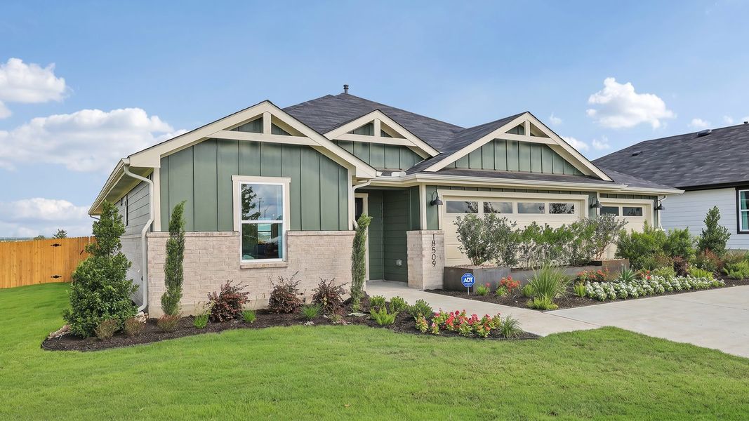 Representative exterior photo of a completed home built from the The Fairfield by D.R. Horton in Monarch Ranch, Manor, TX (Image 24).