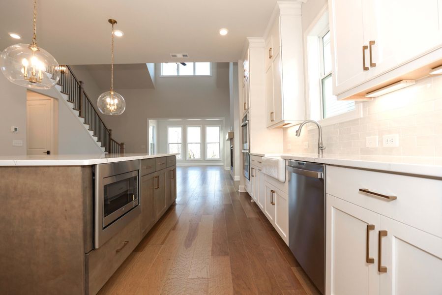Representative furnished interior of a home built from the The Maddox by The Providence Group in Bellmoore Park, Johns Creek (Image 13).