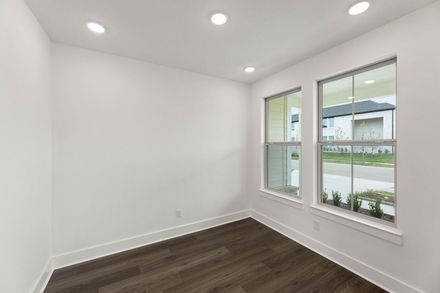 Spacious, unfurnished interior of a new home in Cottage Collection at Harvest, Argyle (Image 15).