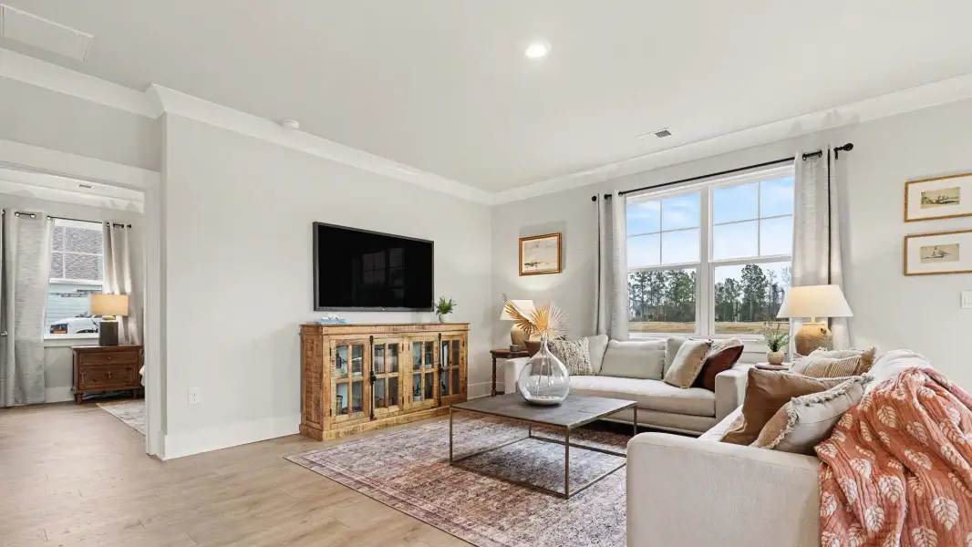 Representative furnished interior of a home built from the Belfort by D.R. Horton in Riverlake, Supply (Image 5).