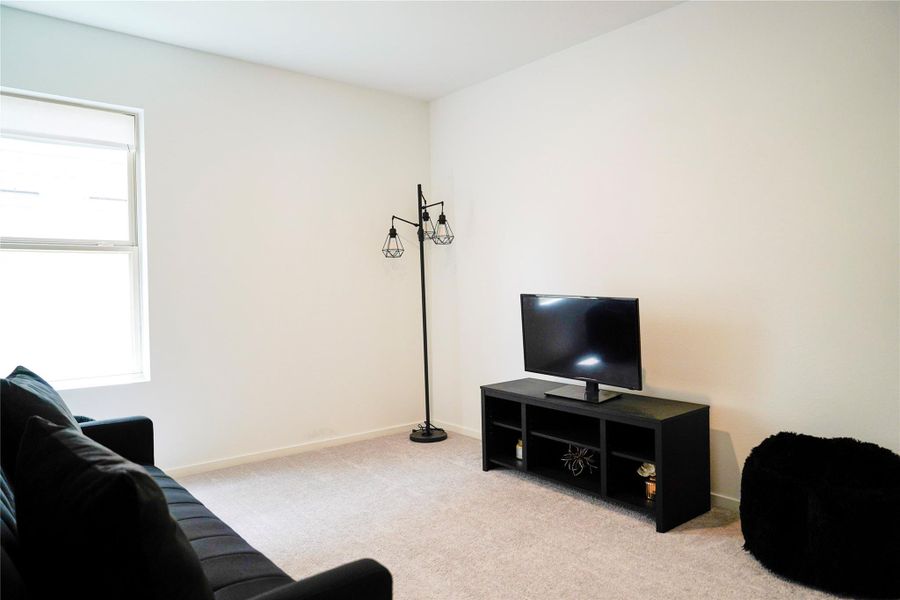 Furnished interior view inside a new home in Sunterra, Katy (Image 12).