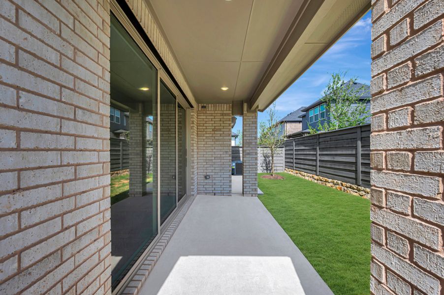 Exterior details and patio area of a home in Union Park, Little Elm (Image 3). Exterior details and patio area of a home in Union Park, Little Elm (Image 3).