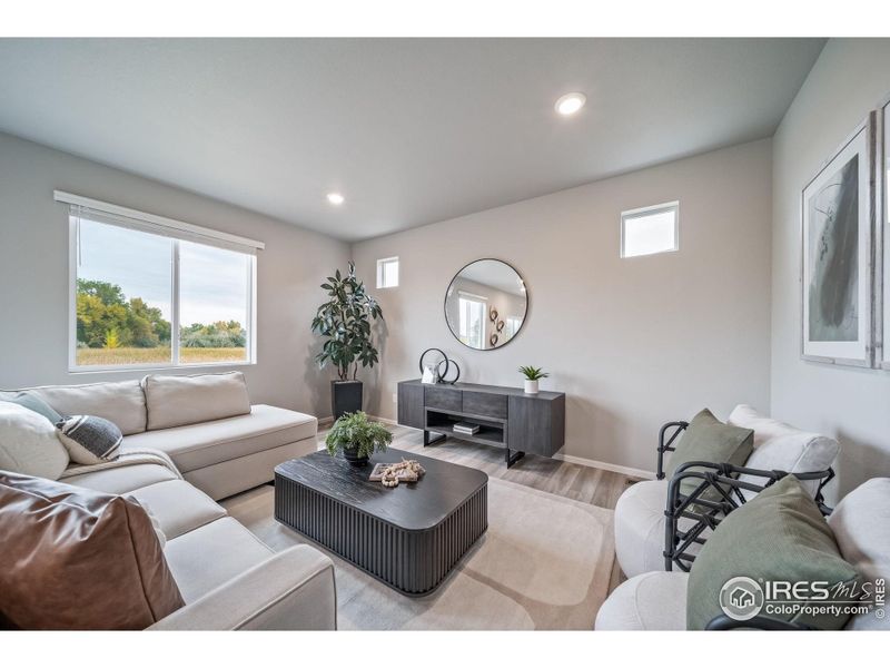 Furnished interior view inside a new home in Thompson River Ranch, Johnstown (Image 33).