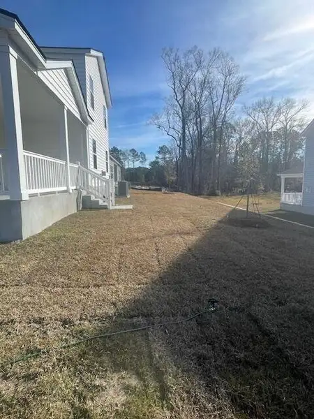Exterior details and patio area of a home in Limehouse Farms, Summerville (Image 2).