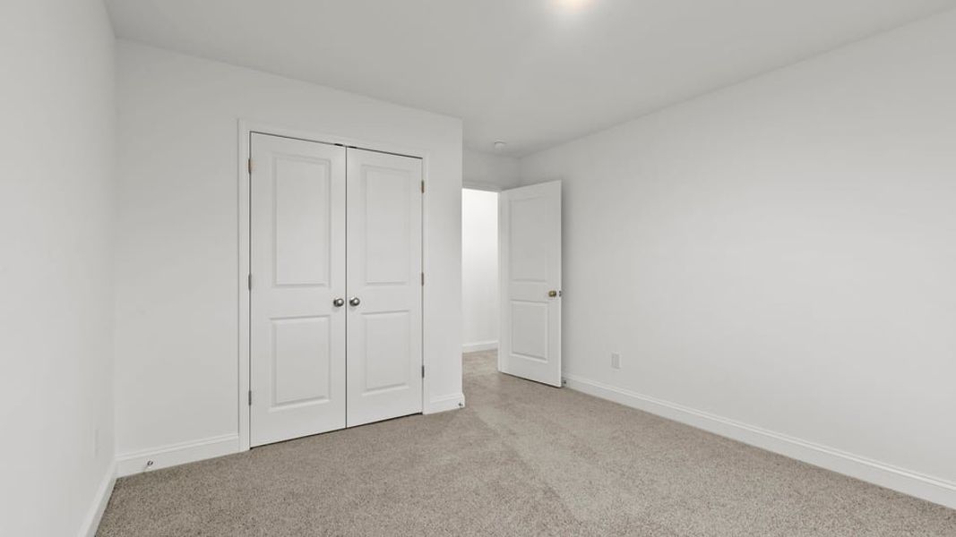 Representative unfurnished interior of a home built from the Interior Unit by D.R. Horton in Pearson Road Townhomes, Easley (Image 25).