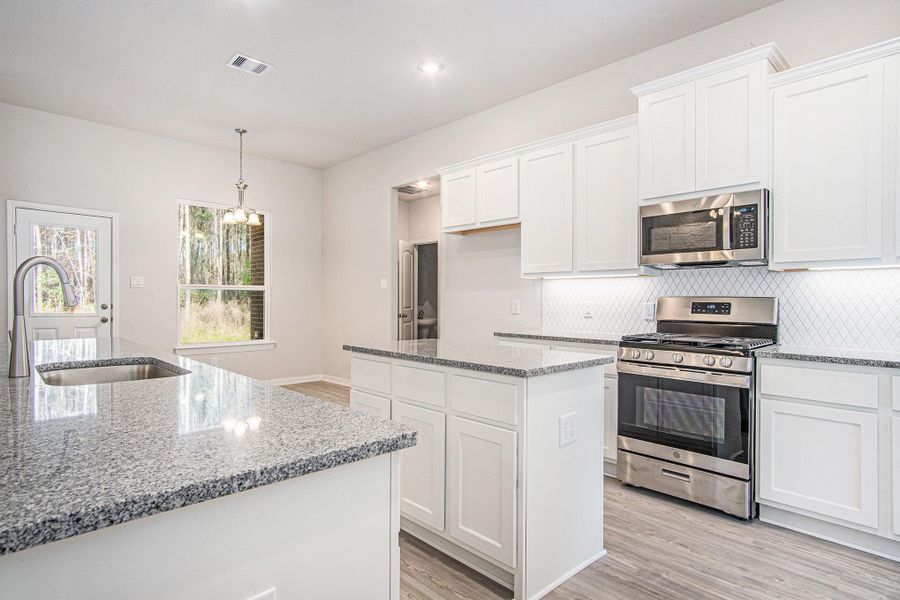 Gorgeous New 1 Story home! Representation Photos only of the Montgomery Plan. Colors and selections may vary! Hurry, Call Today!