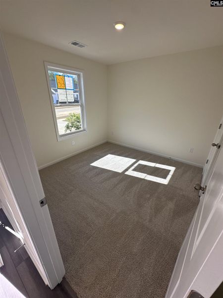Spacious, unfurnished interior of a new home in Piney Woods Bluff, Columbia (Image 10).