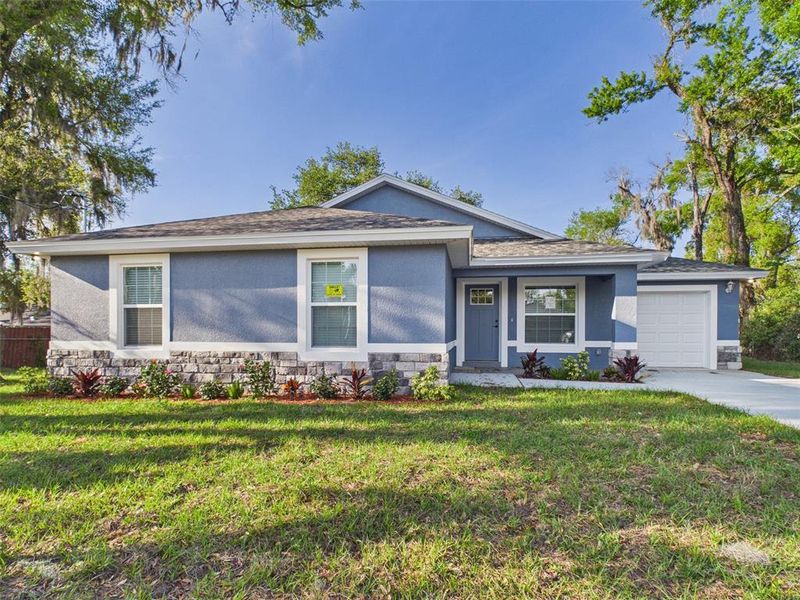 Front exterior of a new home in , Lakeland, FL, highlighting curb appeal (Image 17). Front exterior of a new home in , Lakeland, FL, highlighting curb appeal (Image 17).