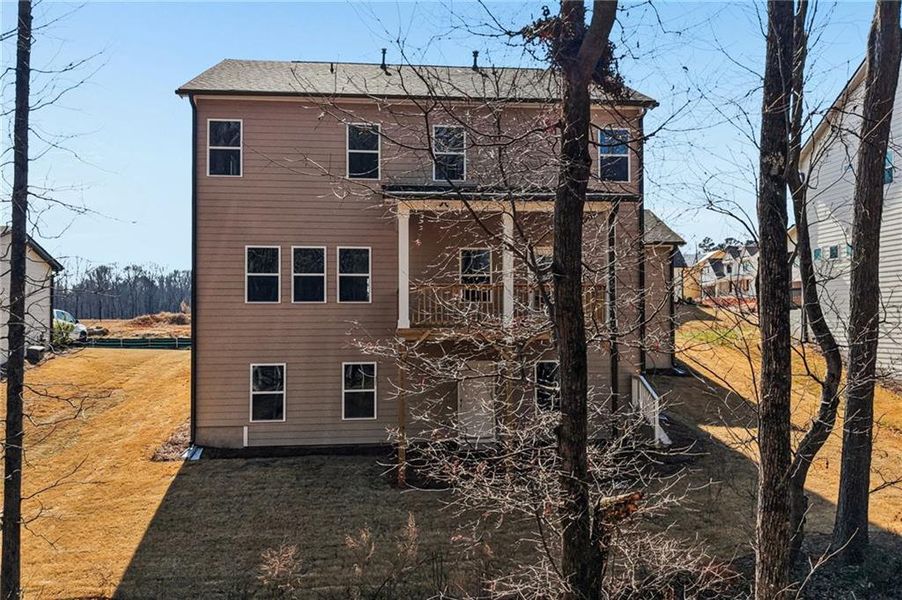 Exterior details and patio area of a home in Rosewood Lake Estates, Hoschton (Image 36).