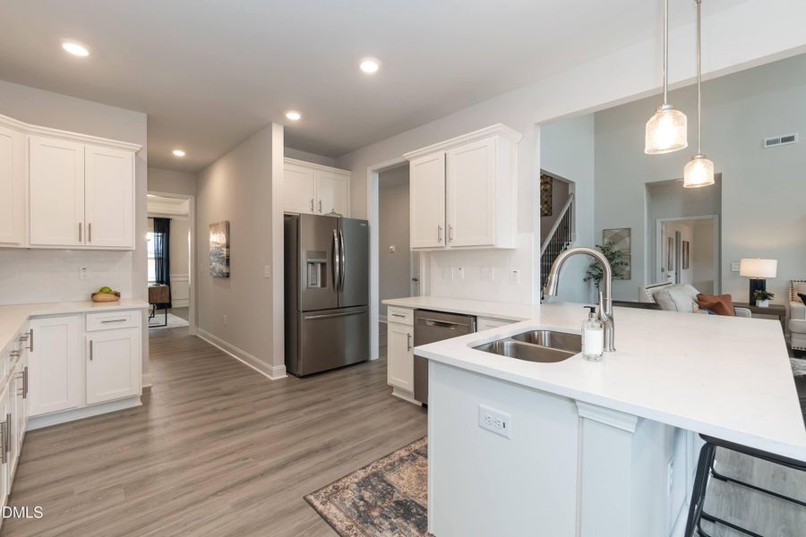 Furnished interior view inside a new home in Hidden Pines, Cameron (Image 6).