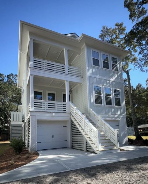 Front exterior of a new home in , Mount Pleasant, SC, highlighting curb appeal (Image 1).