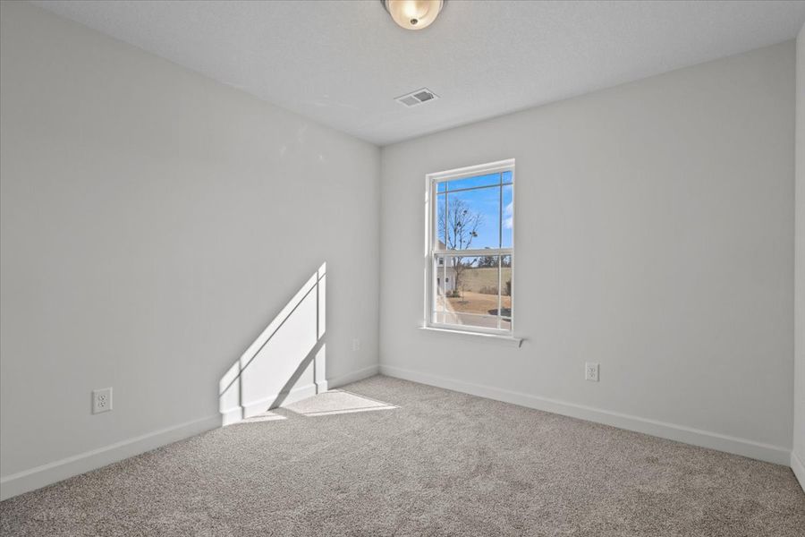 Representative unfurnished interior of a home built from the Roebuck by Enchanted Homes in Las Palomas Country Club Estates, La Vernia (Image 31).