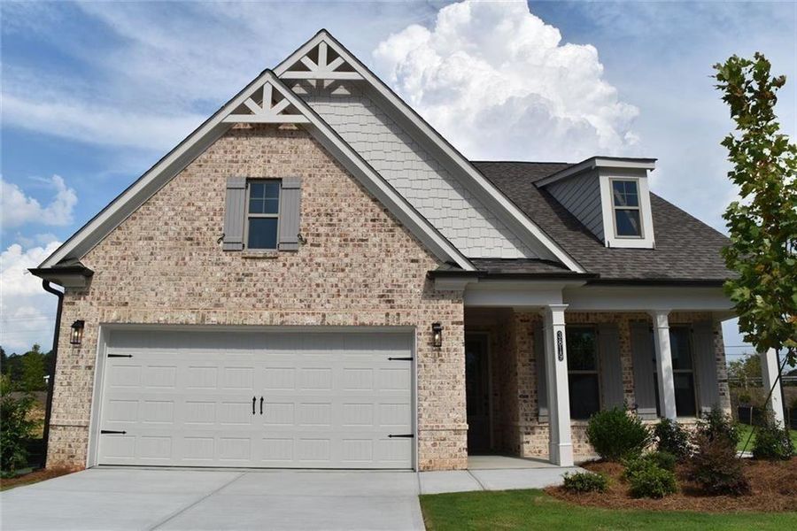 Front exterior of a new home in Soleil Summit Chase, Snellville, GA, highlighting curb appeal (Image 1).