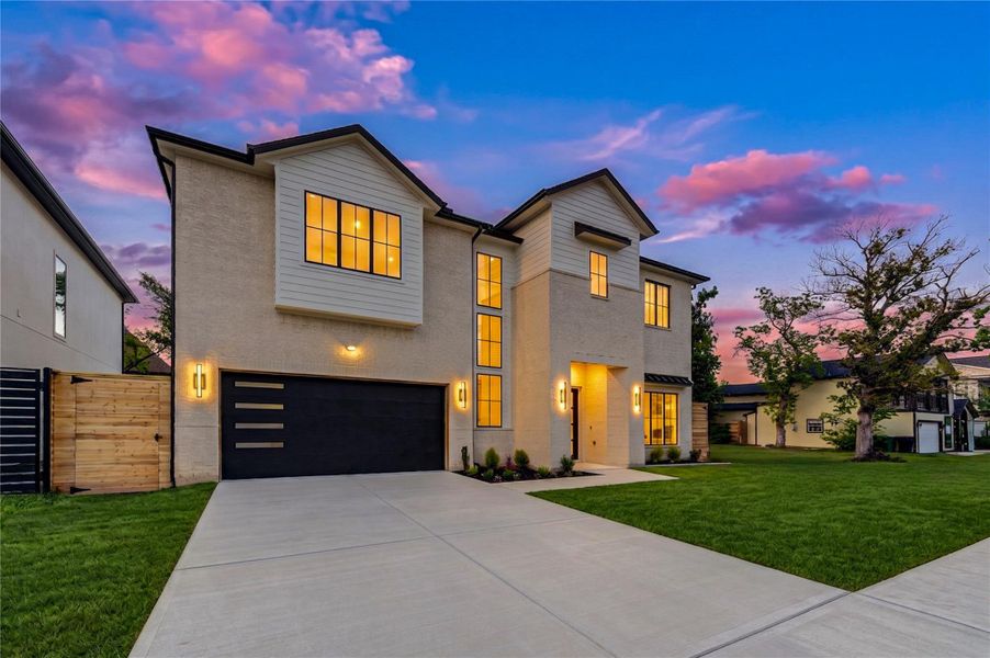 Luxury living begins at the front door with striking modern design, upscale finishes, and over 4,400 SF of thoughtfully curated living space.