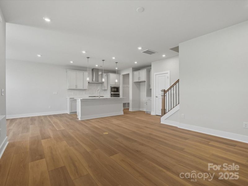 Gourmet kitchen facing the great room so you never miss a moment.