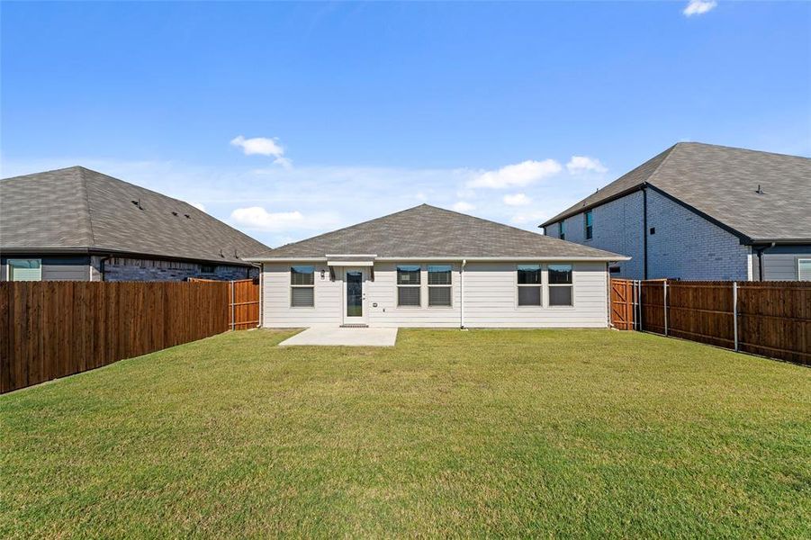 Exterior details and patio area of a home in River Ridge, Crandall (Image 3).