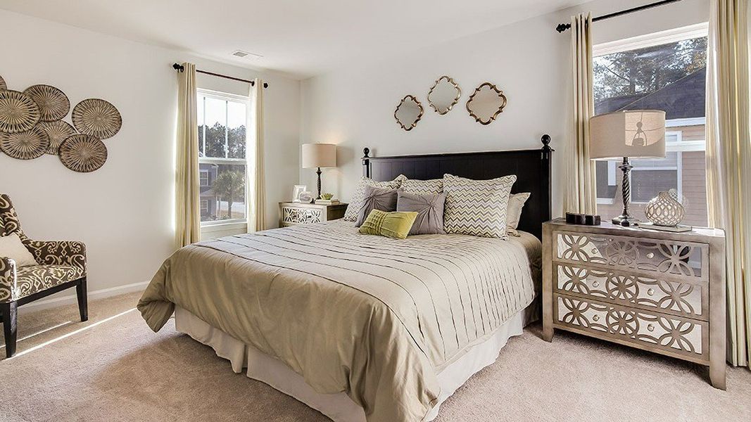 Representative furnished interior of a home built from the Aisle by D.R. Horton in Cobblestone Village, Savannah (Image 12).