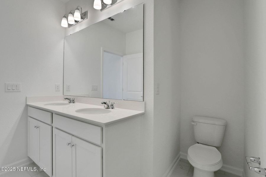 Furnished interior view inside a new home in Silver Landing at SilverLeaf, St. Augustine (Image 6).