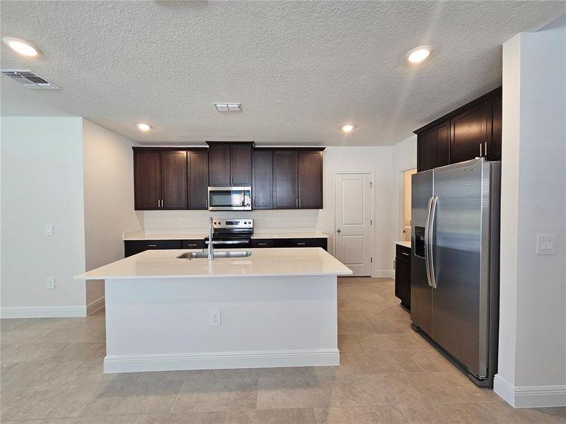 Furnished interior view inside a new home in The Reserve at Hammock Oaks - Classic Series, Lady Lake (Image 13).