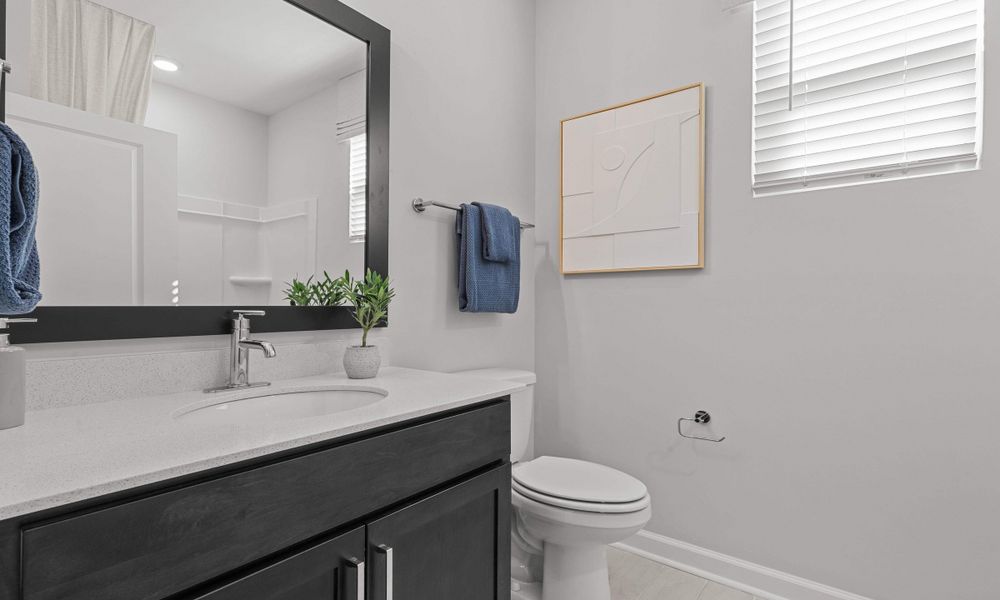 Representative furnished interior of a home built from the The Orchid by Chesapeake Homes in Traditions at Carolina Forest, Myrtle Beach (Image 17).
