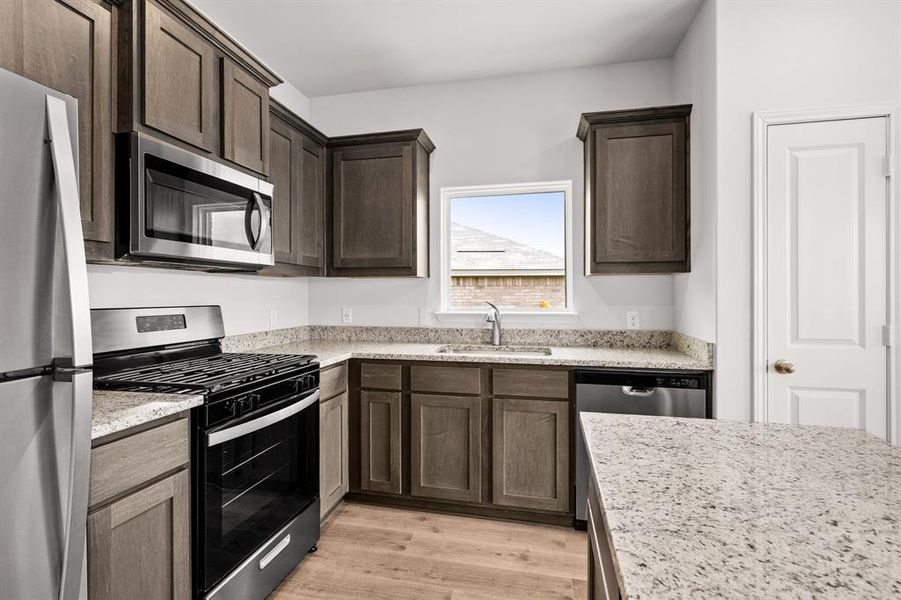 Furnished interior view inside a new home in Patriot Estates, Venus (Image 6).