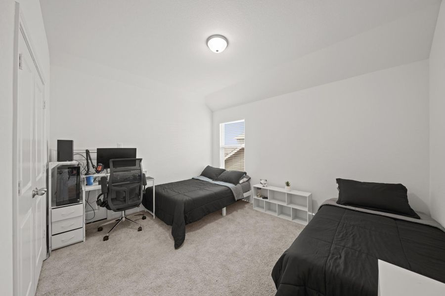 This spacious, secondary bedroom is located on the other side of the full-bath.