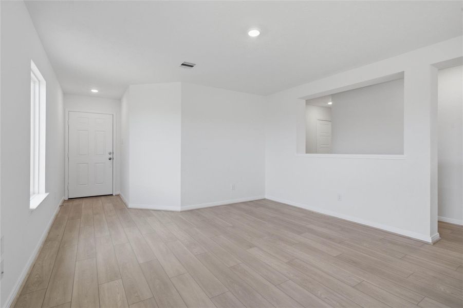 Step into your new home at 1519 Valley Creek and be greeted by Layton Lake vinyl plank flooring in Silver Dollar and fresh, bright paint—all coming together to create a warm and welcoming entryway.